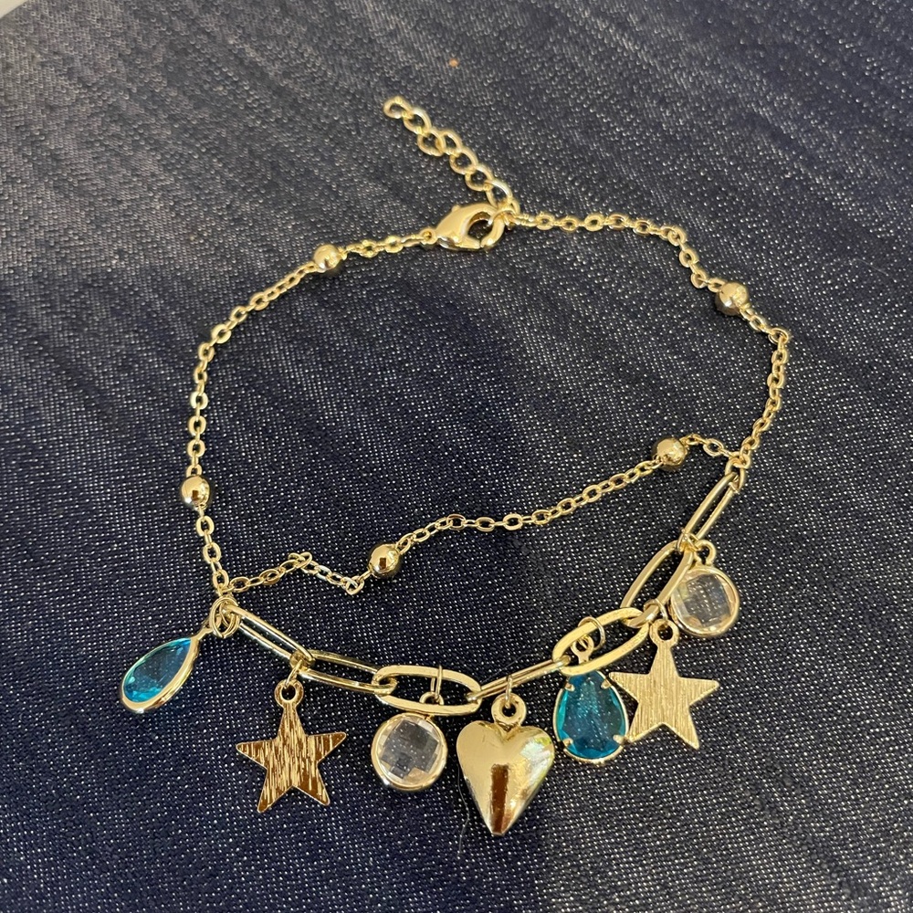 Gold Charm Bracelet with Blue and Gold Accents